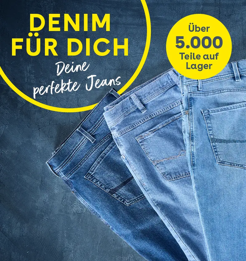 Mehrere Jeans in verschiedenen Blautönen liegen leicht versetzt übereinander