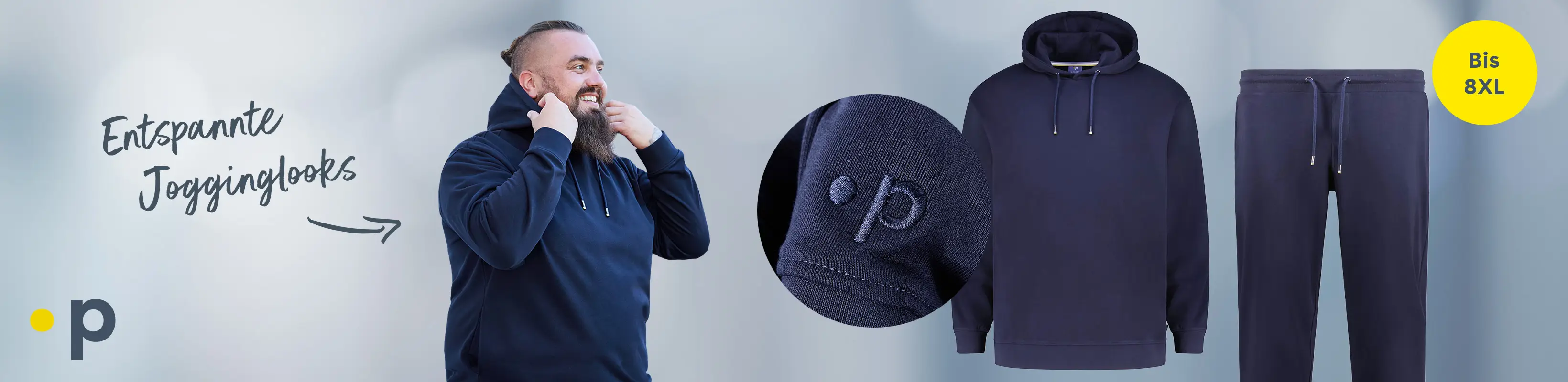 Person trägt dunkelblauen Hoodie aus Jogging-Kollektion, entspannter Look bis Größe 8XL.