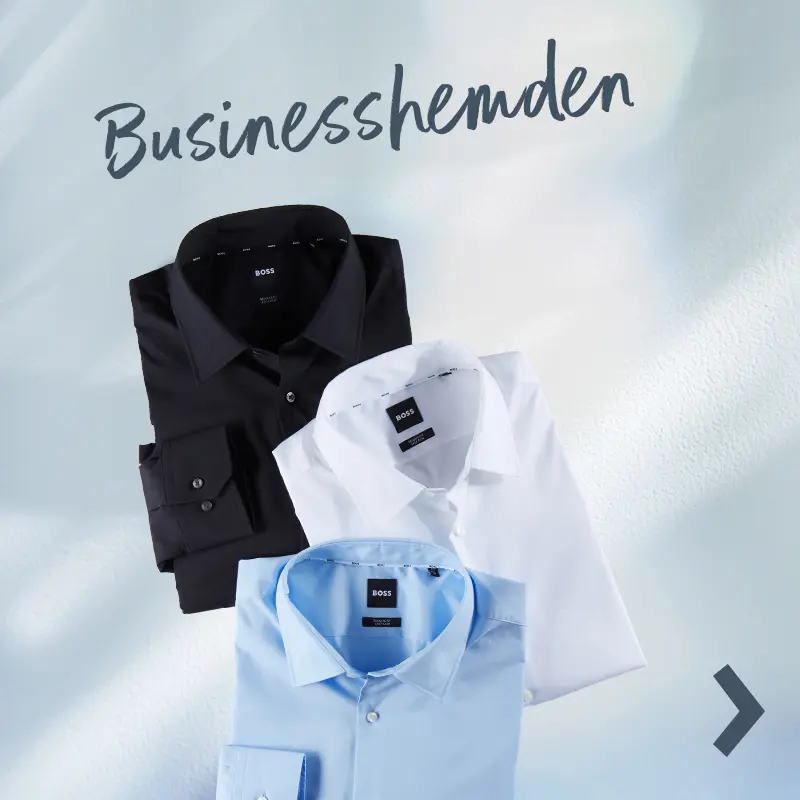 Drei gefaltete Businesshemden auf hellem Hintergrund. Der Schriftzug „Businesshemden“ verweist auf die gesamte Hemden-Kategorie mit vielfältigen Farben und Schnitten.