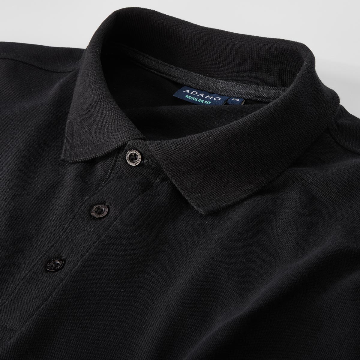 ADAMO Poloshirt mit elastischem Bund schwarz