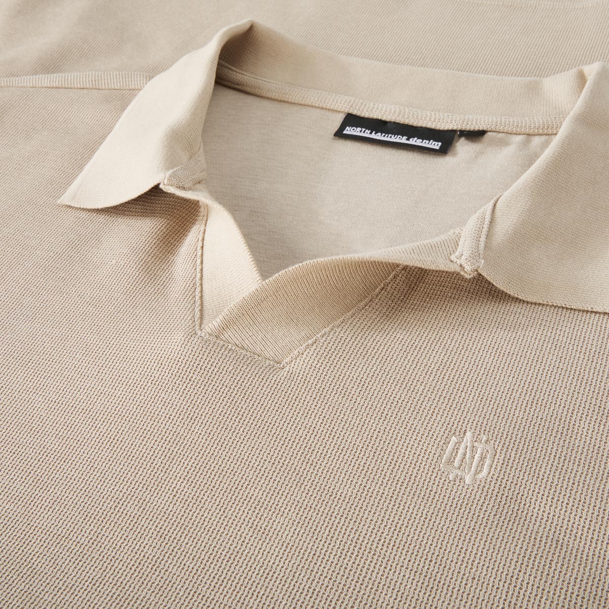 North Strickpolo aus Baumwolle sand
