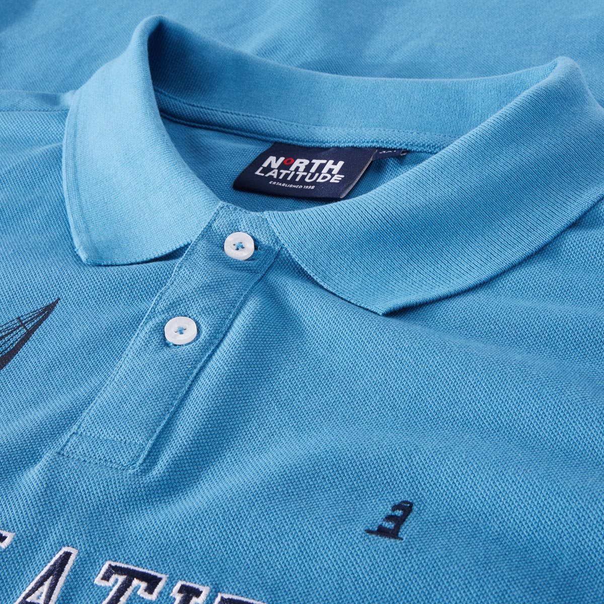 North Poloshirt mit Label-Stickerei mittelblau