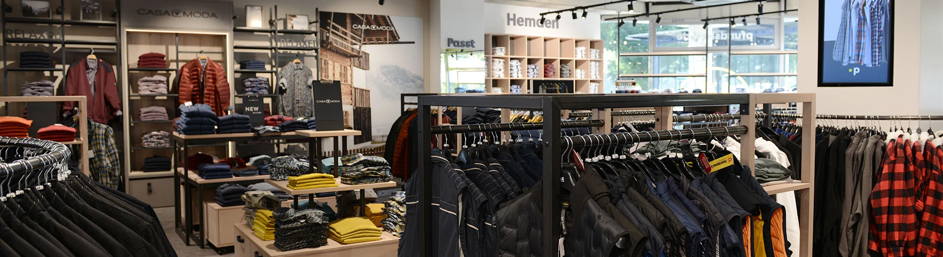 Große Auswahl an Übergrößen-Jacken und Hemden im modernen Store