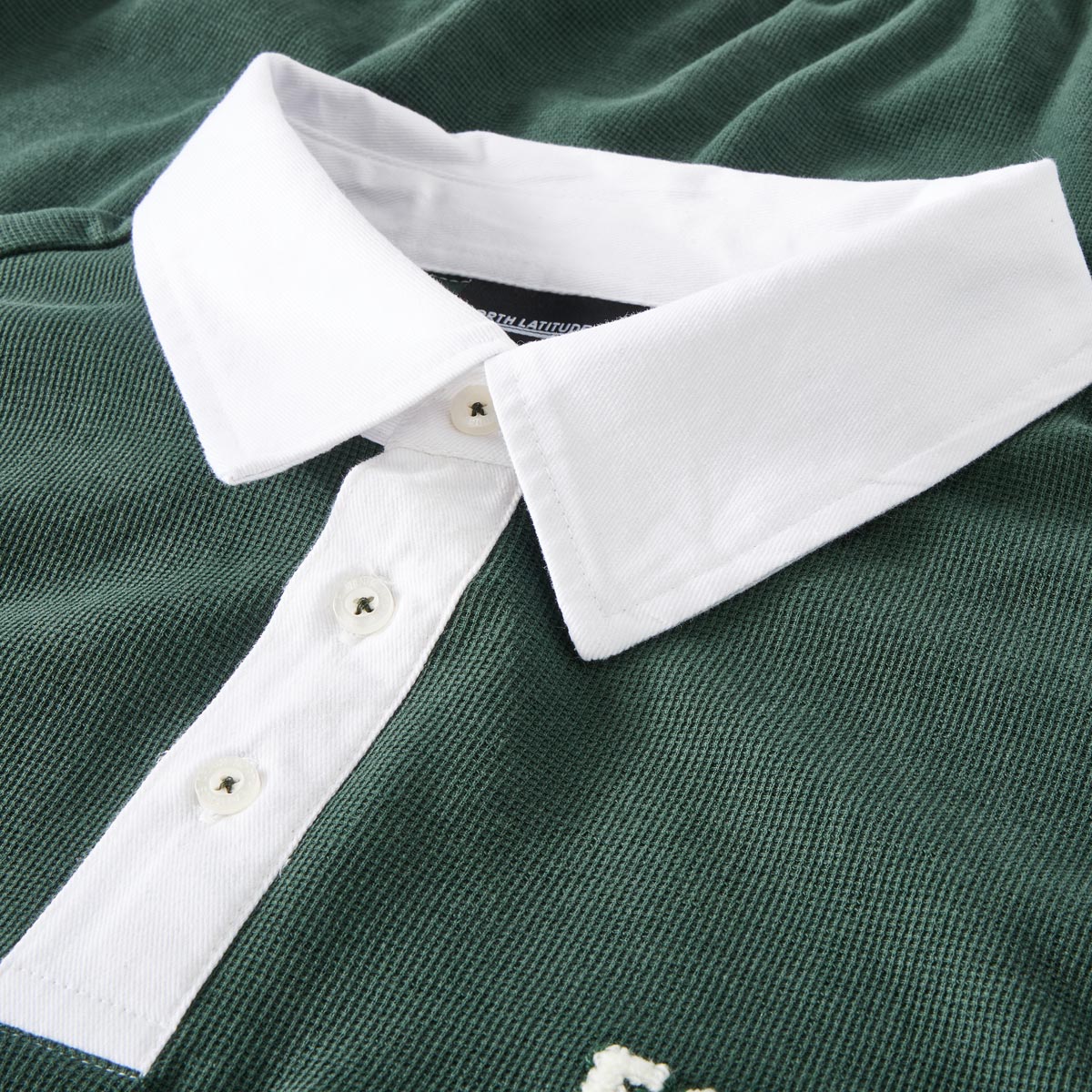 North Poloshirt mit Stickerei grün